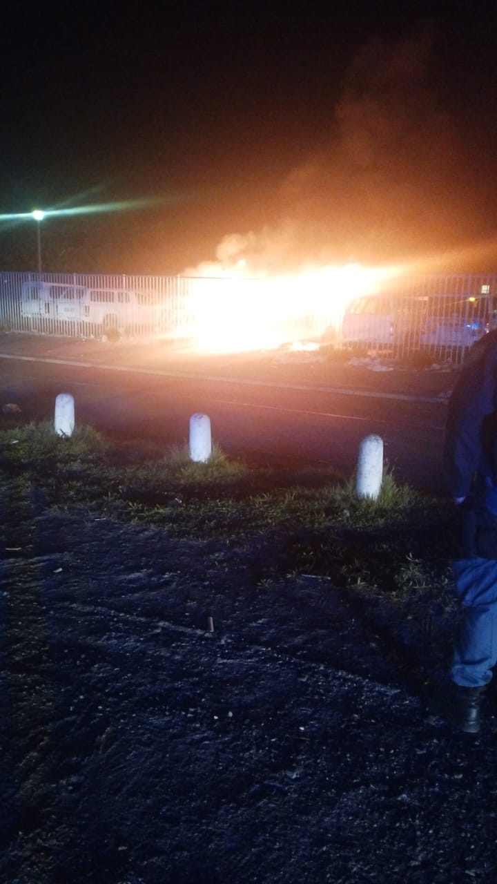 Vehicles burn at Delft depot as taxi strike drags on