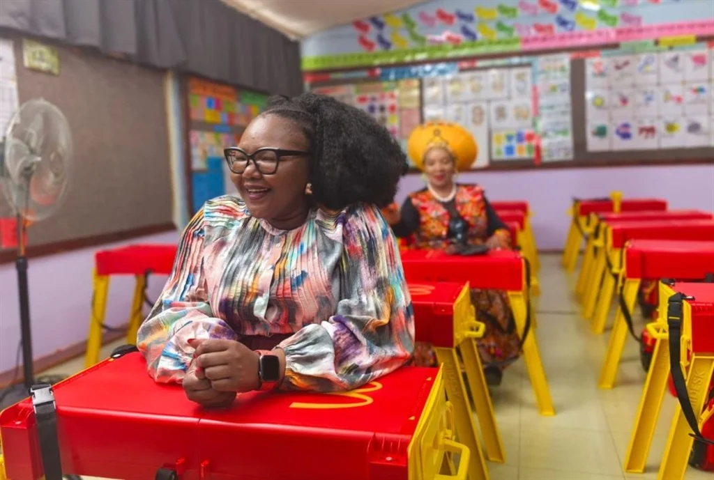 DBE accepted the McDonalds-endorsed foldable desks due budget constraints